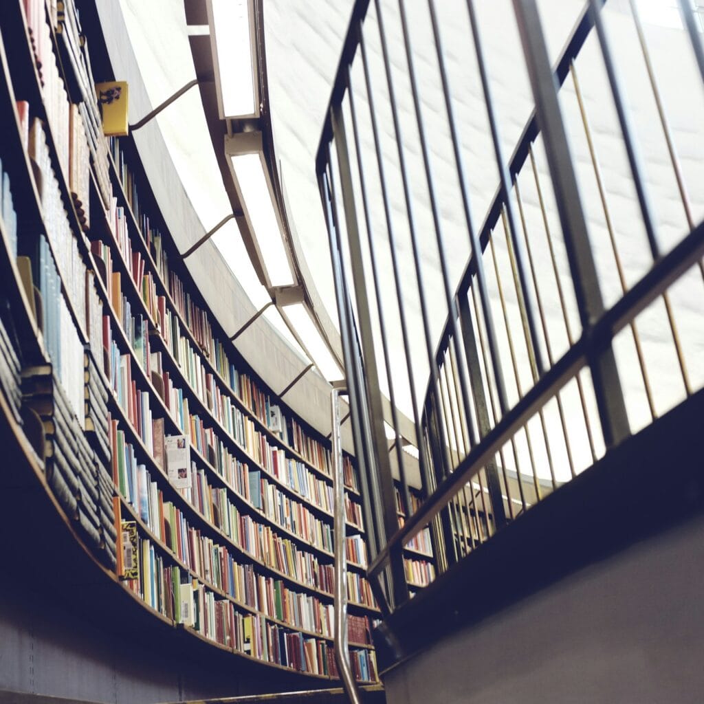 architectural library interior with bookshelves